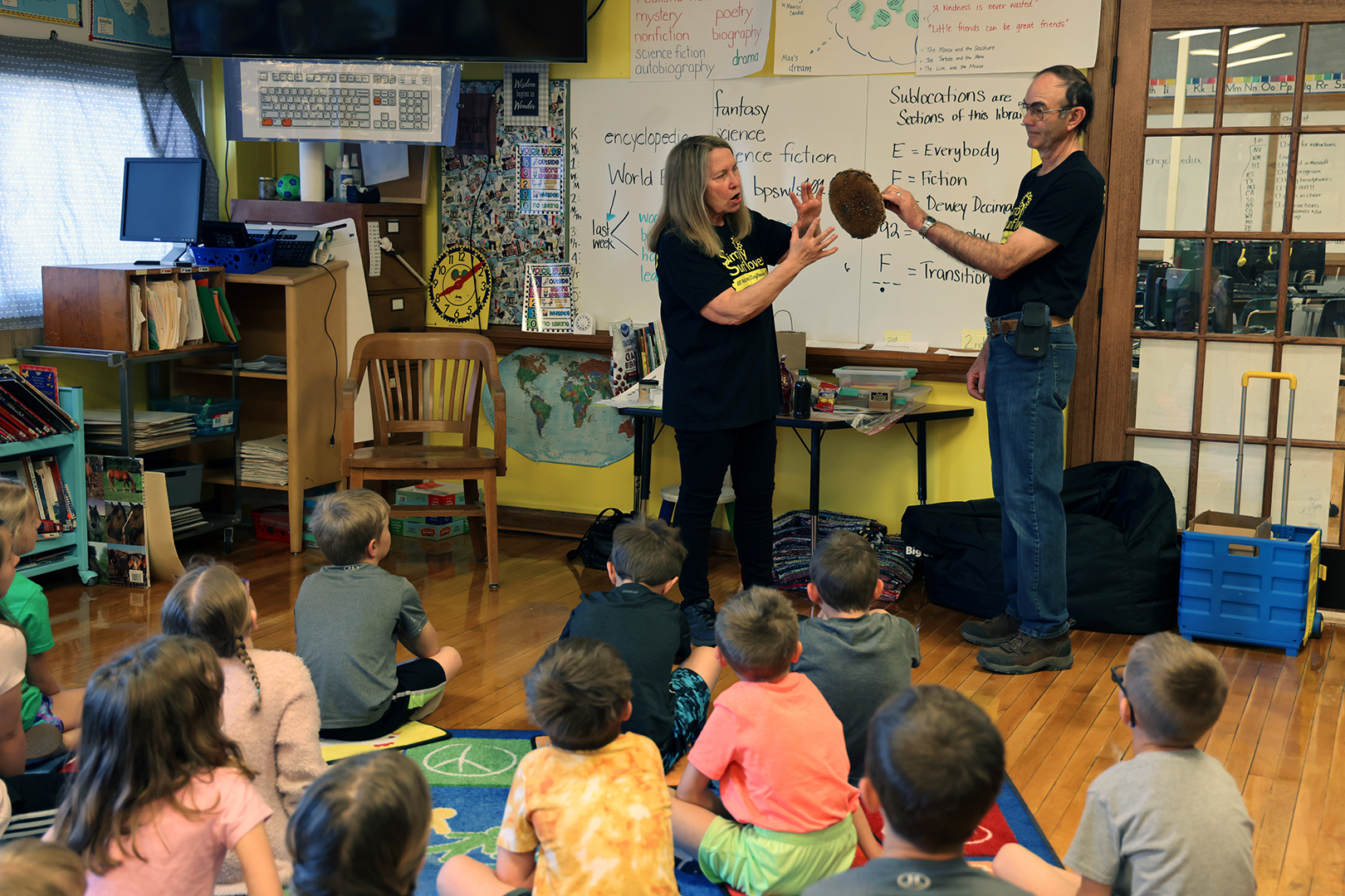 Children learn about sunflower oil at a farm to school presentation.