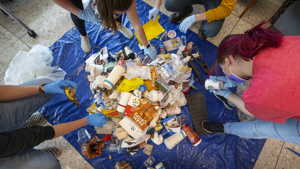 The landfill section of the Hardin Hall recycling stations are sorted by the students. Environmental Studies Orientation students work on a waste audit of Hardin Hall, Ag Hall, and Filley Hall as part of a class project. March 24, 2021. Photo by Craig Chandler | University Communication